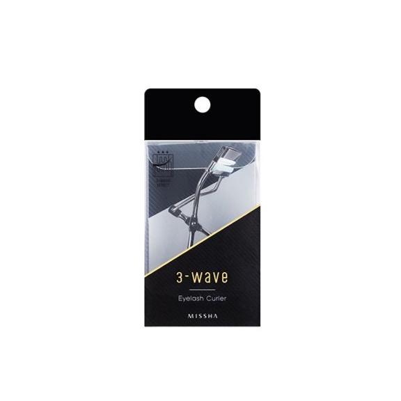 Compact eyelash curler in sleek black and silver packaging designed for easy curling and smooth use