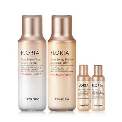 Four bottles of Floria Nutra Energy skin care products with a soft beige and pearl gradient design