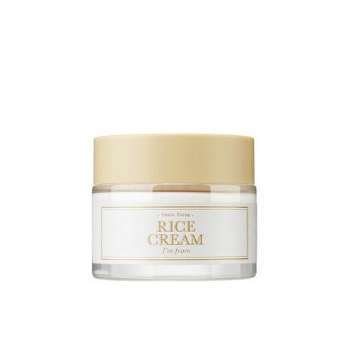 Clear jar of creamy moisturizing rice cream with soft beige lid emphasizing moisture retention benefits