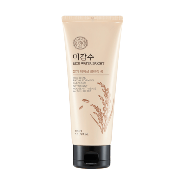Cream-colored tube of foaming cleanser with rice bran illustration and black flip cap for deep cleansing ritual
