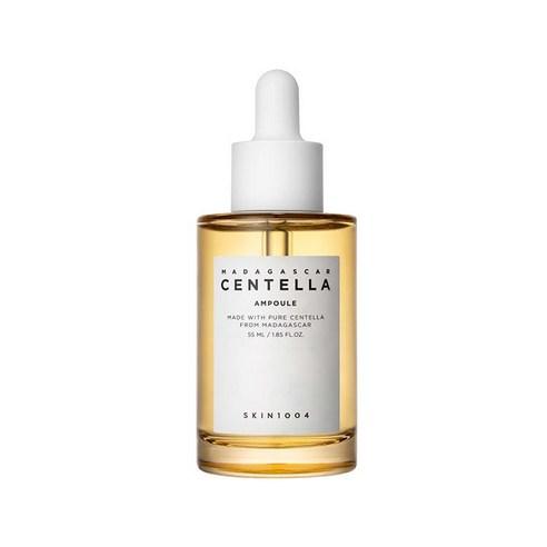 Clear glass dropper bottle with golden liquid centella ampoule for skin repair on white background