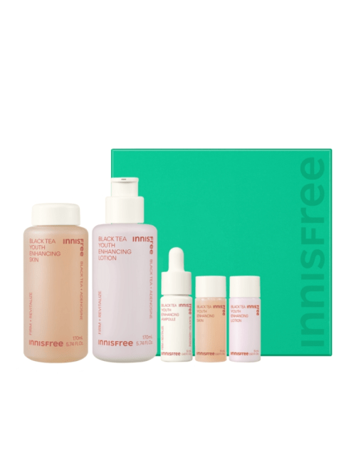 Green box with a set of skincare bottles and dropper focused on youth enhancing and antioxidant benefits