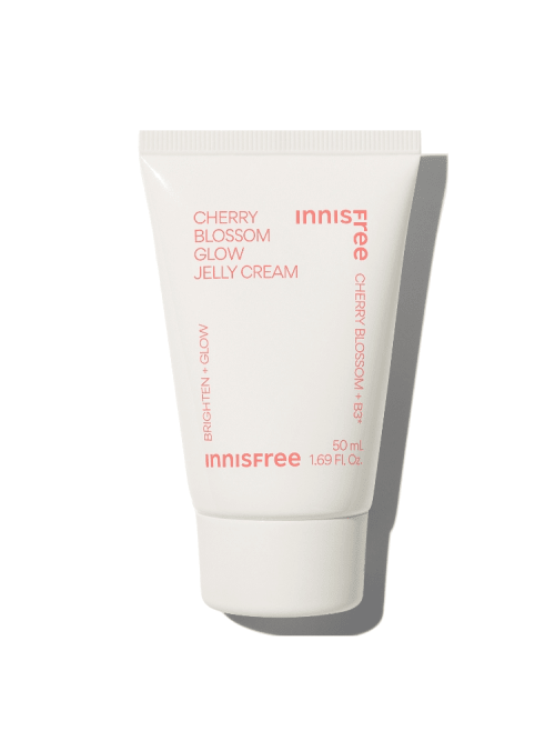 White tube of glow jelly cream with soft pink text highlighting cherry blossom and hydration boost benefits on white background