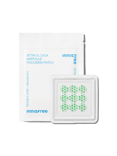 White pouch with blue text and a clear tray holding nine small green dotted ampoule focus patches