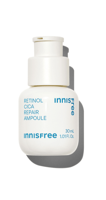 White dropper bottle of retinol cica repair ampoule with blue text on a bright white background