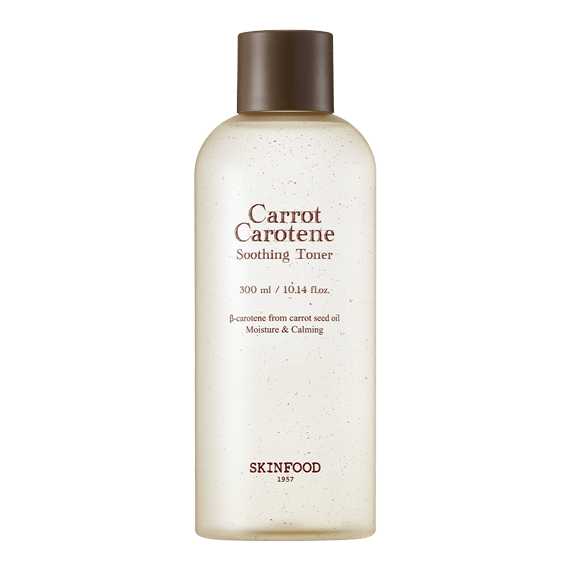 Translucent toner bottle with brown cap containing soothing carrot extract formula for hydration and calming effects