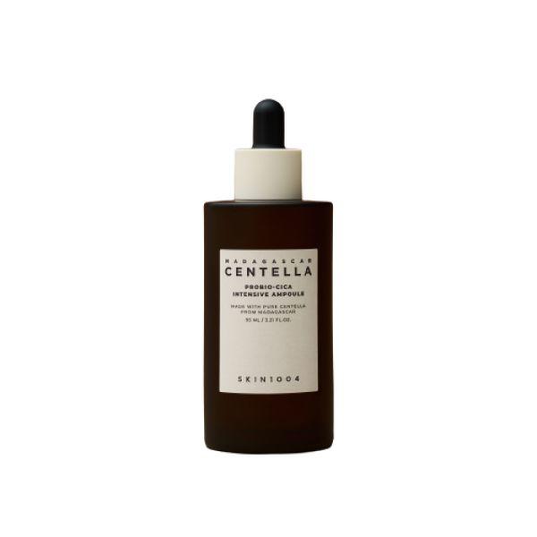 Brown glass dropper bottle of SKIN1004 Probio-Cica ampoule for instant calming skincare benefits on white background