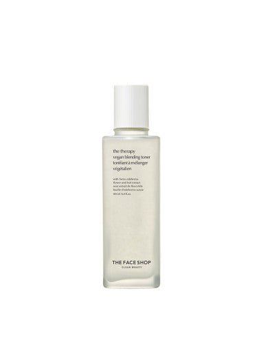 Minimalist frosted bottle of vegan blending toner with white ribbed cap and simple black text on plain white background