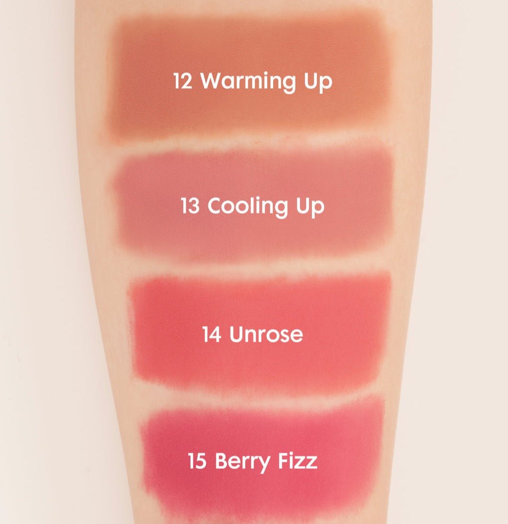 Four vivid lip tint swatches labeled Warming Up, Cooling Up, Unrose, and Berry Fizz on fair skin tone.