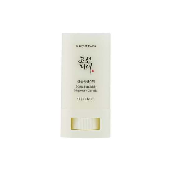 Minimalist white sun stick container with black text for matte mugwort and camelia formula, 18g size