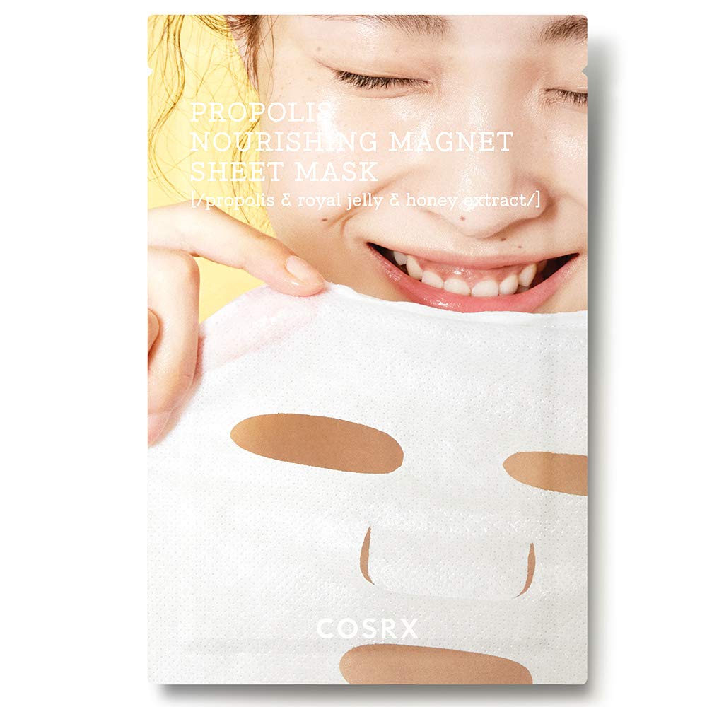 Smiling person holding a white nourishing sheet mask with propolis and honey extract on a yellow background