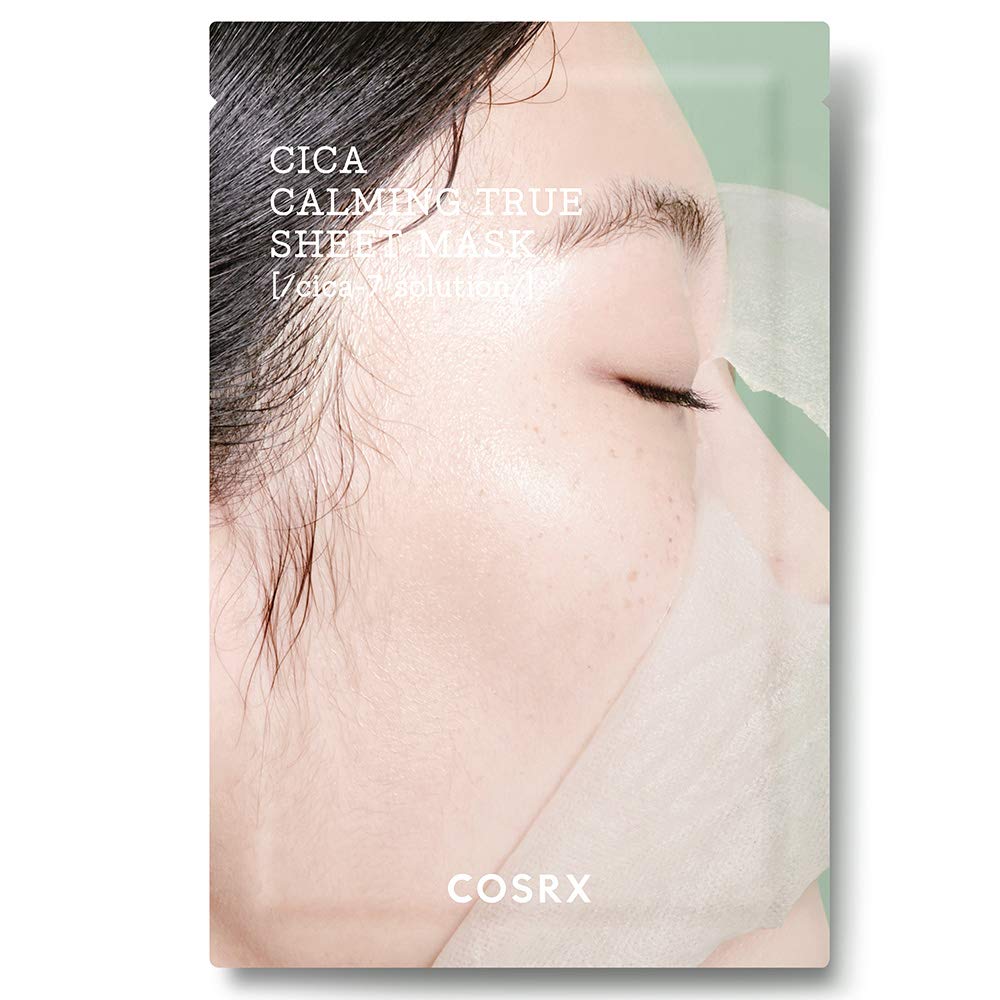 Close-up of a woman with a soothing sheet mask on her face featuring moisturizing complex benefits and calming effect