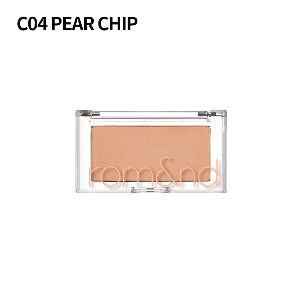 Compact blush in a soft peach shade with minimal clumping, housed in a clear case with subtle branding.