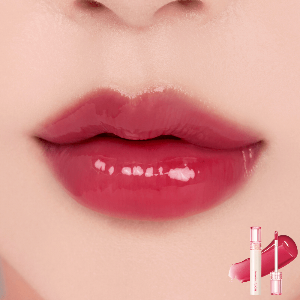 Close-up of lips with bold, glossy red tint showcasing vibrant color and shine from a lip gloss product.