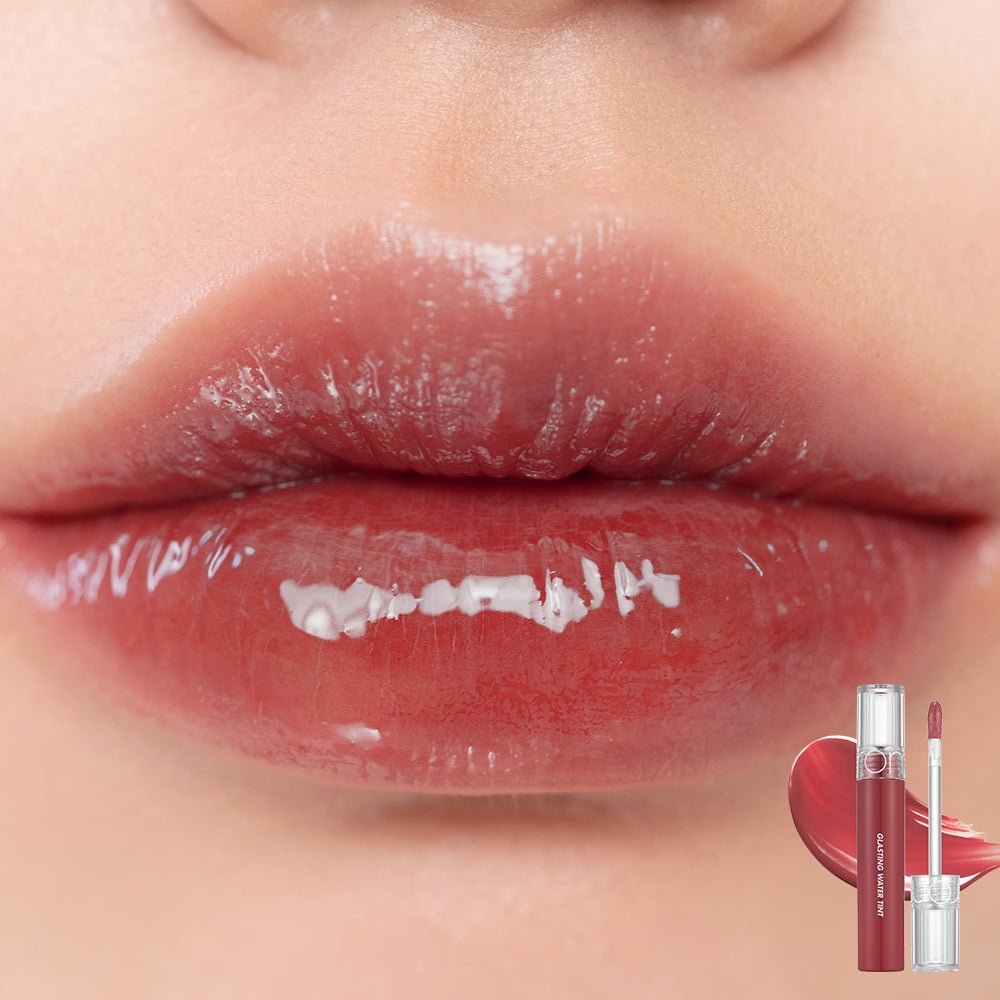 Close-up of lips wearing glossy long-lasting tint with small tube and applicator showing color shade on skin