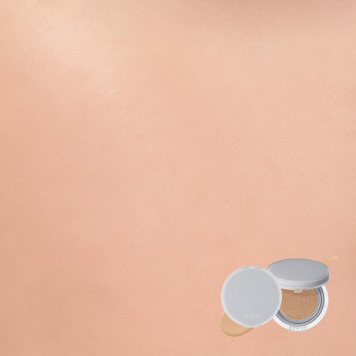 Open compact cushion makeup kit with flawless coverage effect shown on smooth skin background