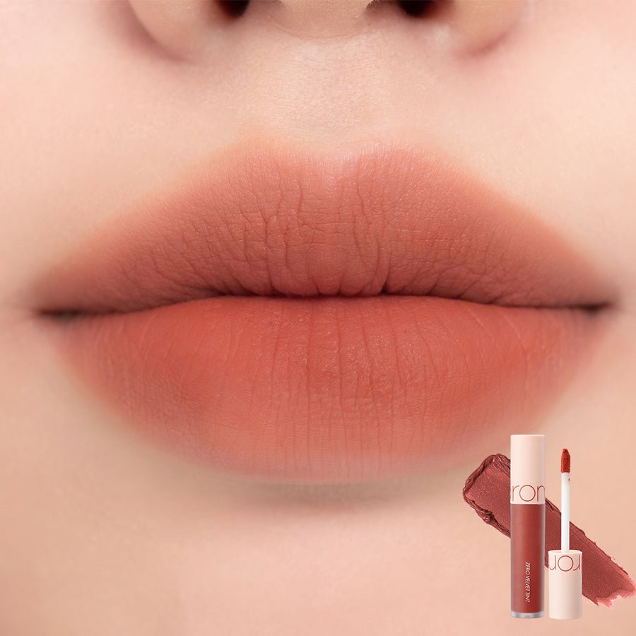 Close-up of lips wearing soft muted rose lip tint with velvet finish beside coordinating lip tint tube and swatch.