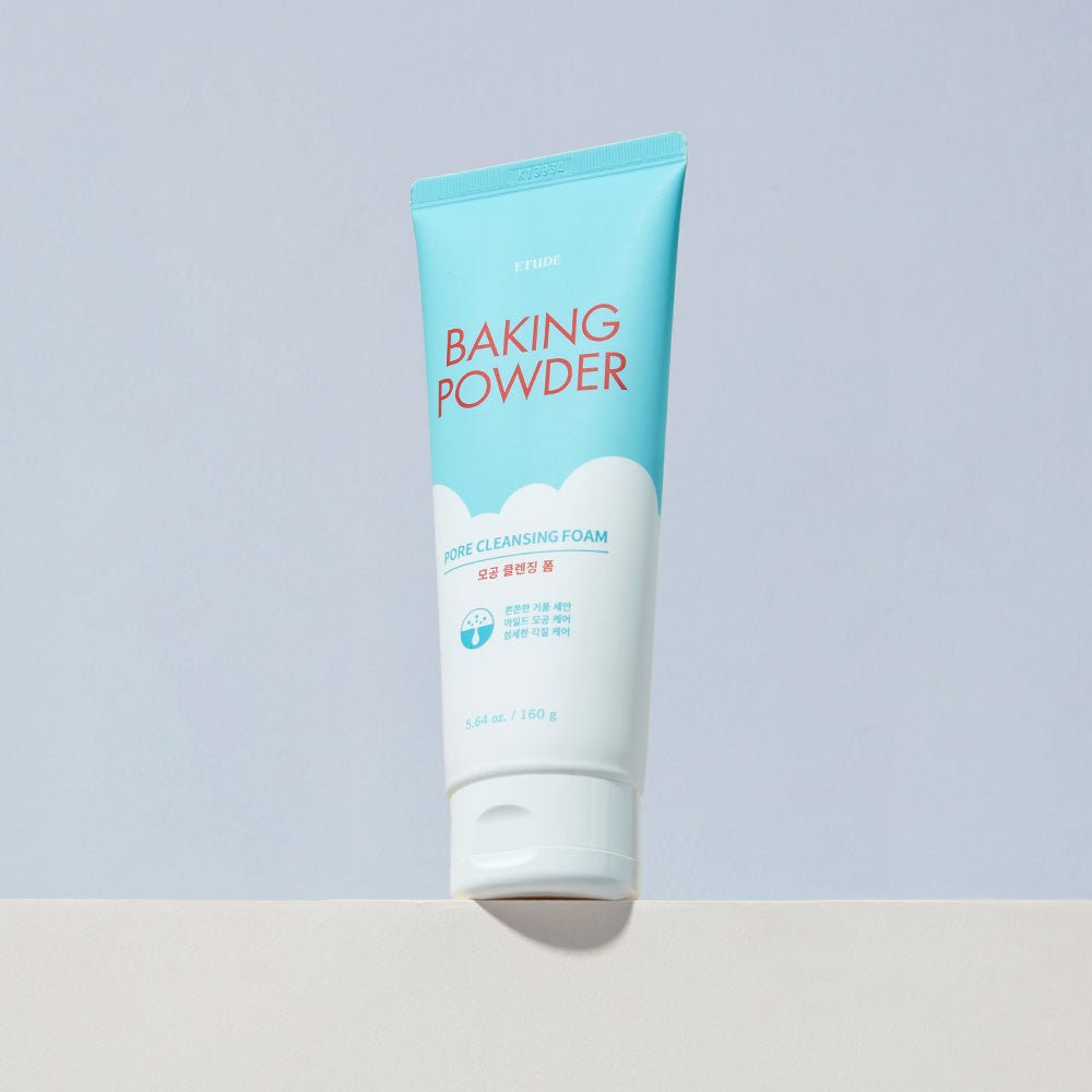 ETUDE Baking Powder Pore Cleansing Foam 160ml in blue and white tube with deep cleansing formula on pale background