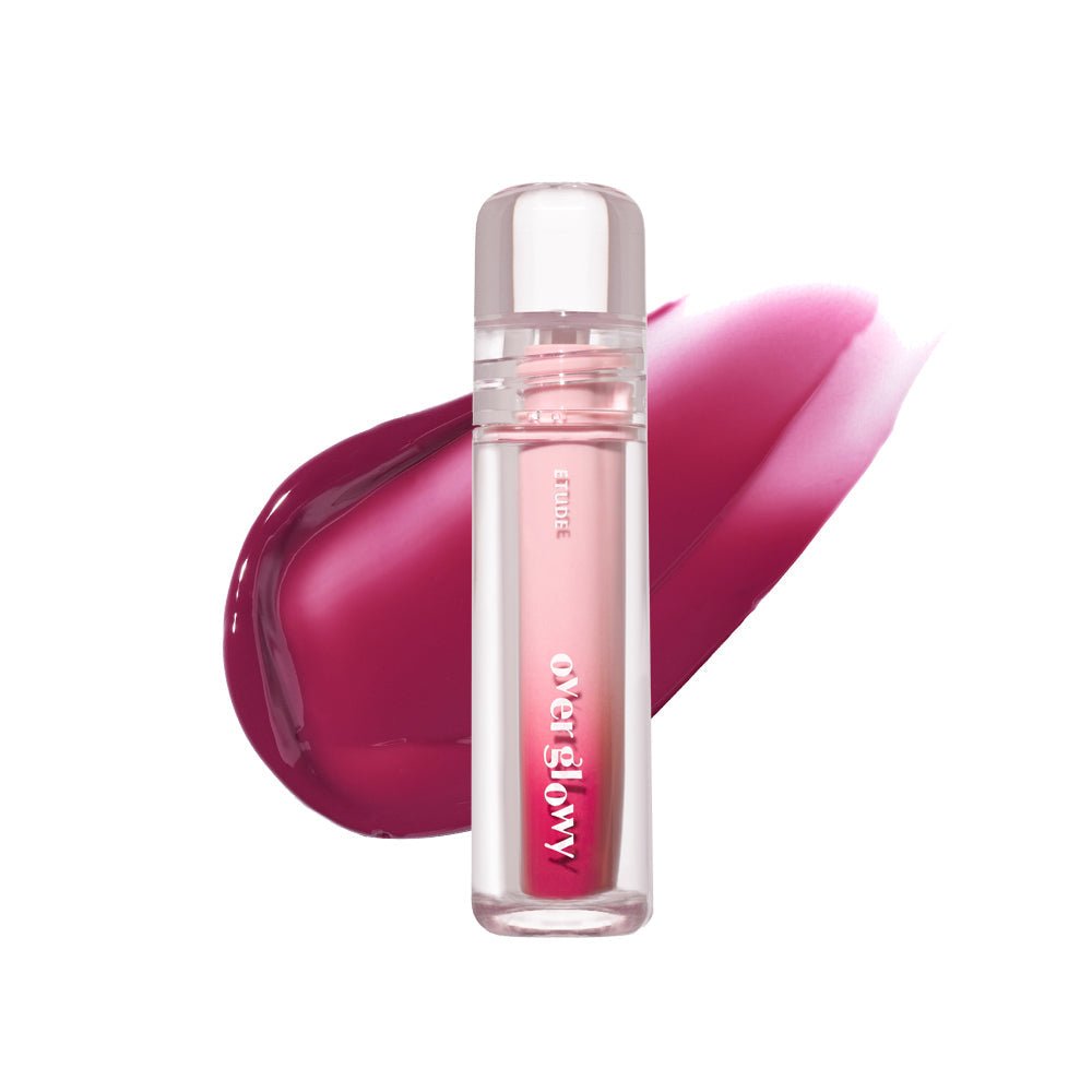 ETUDE Over Glowy Tint 3g in translucent container with vibrant high gloss berry pink liquid tint swatch behind