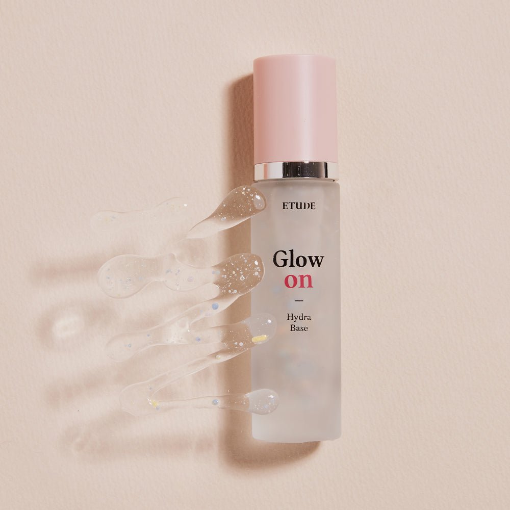 ETUDE Glow On Base Hydra 30ml bottle with clear hydrating gel droplets on beige background