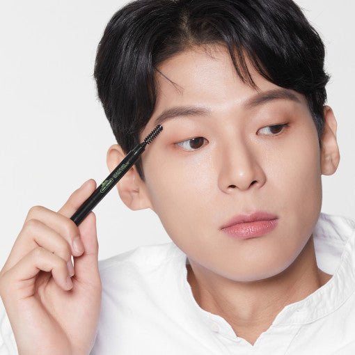 Man applying VT Cica For Men Natural Eyebrow - 2 Colors 0.6g with natural finish for defined brows