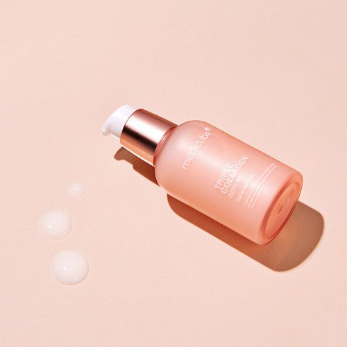 medicube Triple Collagen Serum 4.0 55ml with creamy texture shown with drops highlighting enhanced suppleness benefits