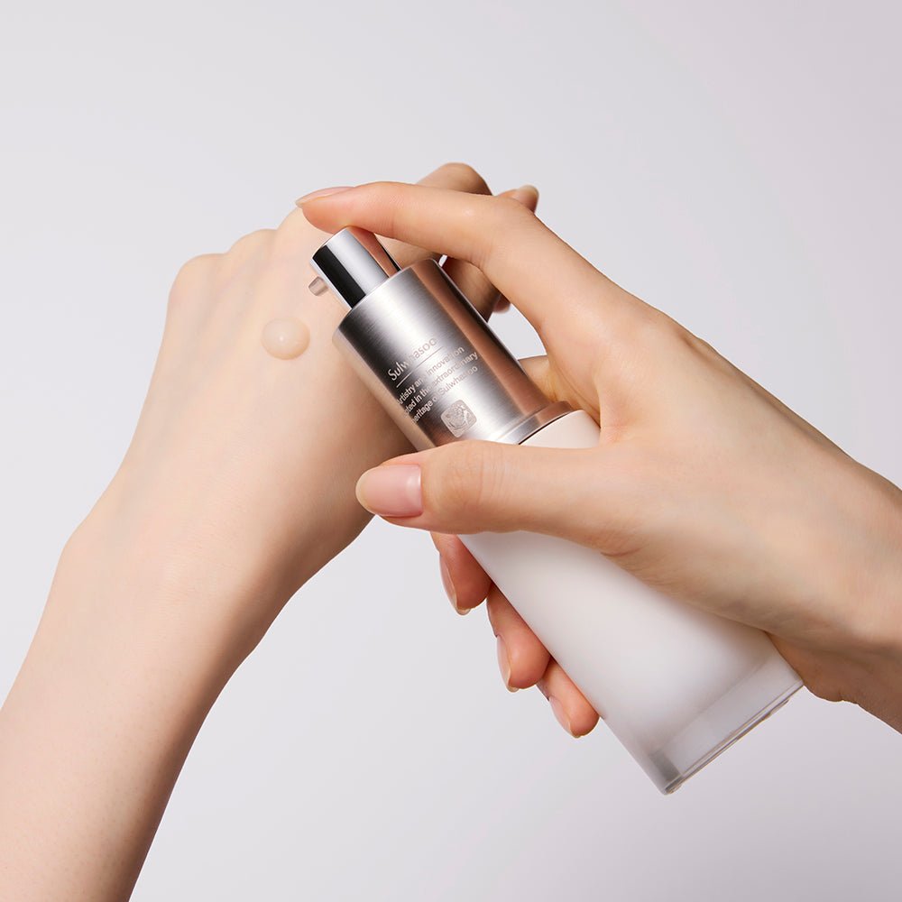 Hand dispensing luxurious serum with smooth, lightweight texture onto skin, highlighting multi-function skincare benefits.