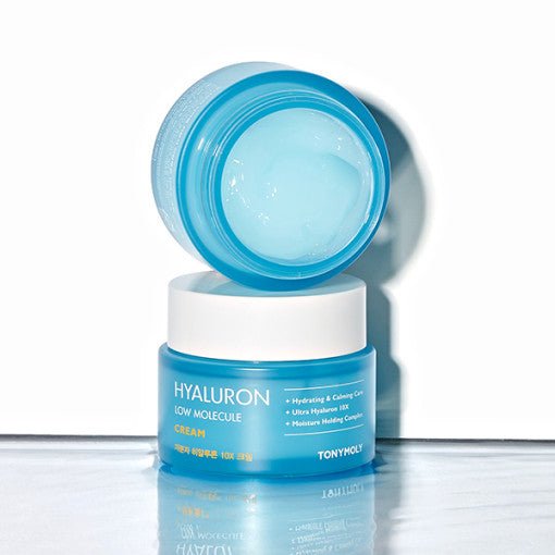 Open blue jar of moisturizing cream with hydrating and moisture lock benefits against white background