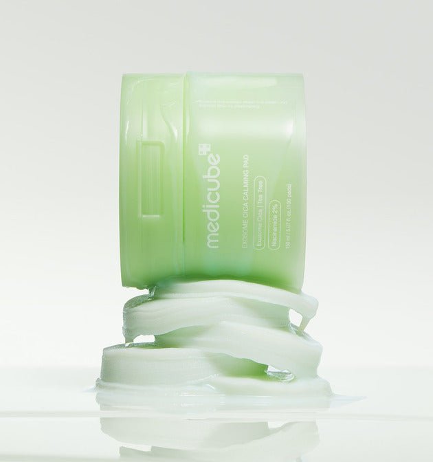 medicube Exosome Cica Calming Pad 150ml/100 Pads in green container with gentle exfoliation and soothing balm components
