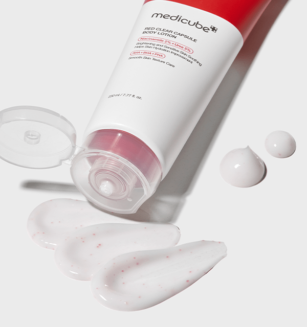 medicube Red Clear Capsule Body Lotion 230ml with smooth textured white cream containing red capsules and open flip cap