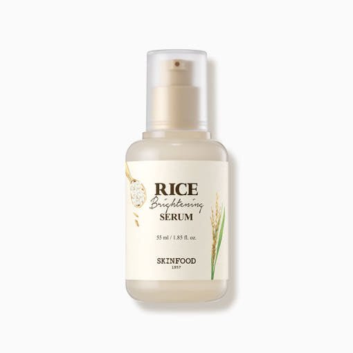 Frosted pump bottle of rice brightening serum with natural beige label and subtle rice grain illustration on white background