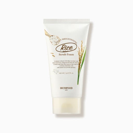 White scrub foam tube with rice grain and stalk illustration emphasizing gentle exfoliation benefits