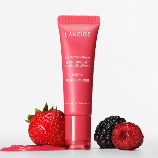 LANEIGE Lip Glowy Balm 10g in berry shade with rich moisture, beside fresh strawberry, raspberry, and blackberry fruits