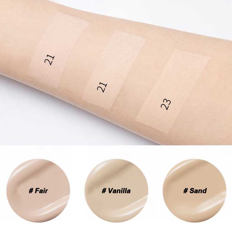 Swatches of three light cushion foundation shades labeled 21 fair, 21 vanilla, and 23 sand on skin tone background