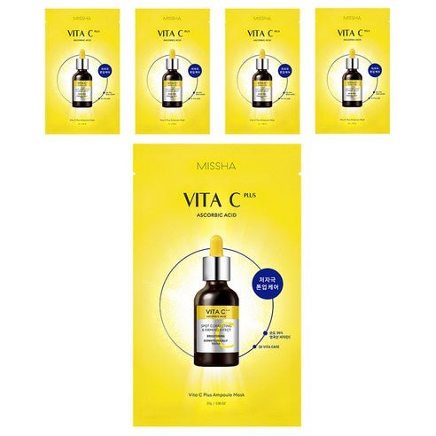 Bright yellow sachets of Vita C Plus ampoule masks featuring dark spot reduction benefits with dropper bottle image on front