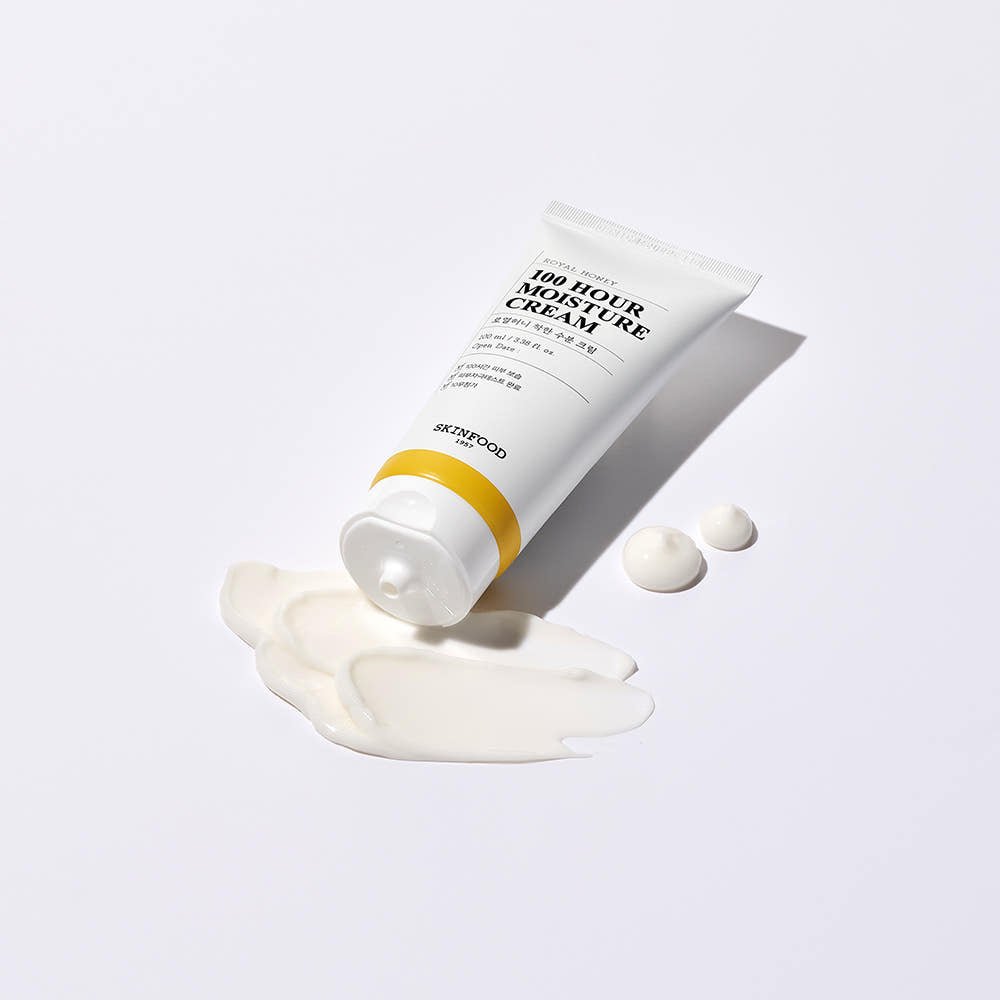 Tube of moisturizing cream with intense hydration benefits, shown with creamy swatches on a white background