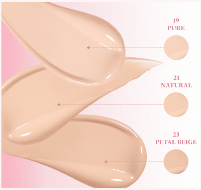Three smooth cushion foundation swatches in shades Pure, Natural, and Petal Beige on a pink background