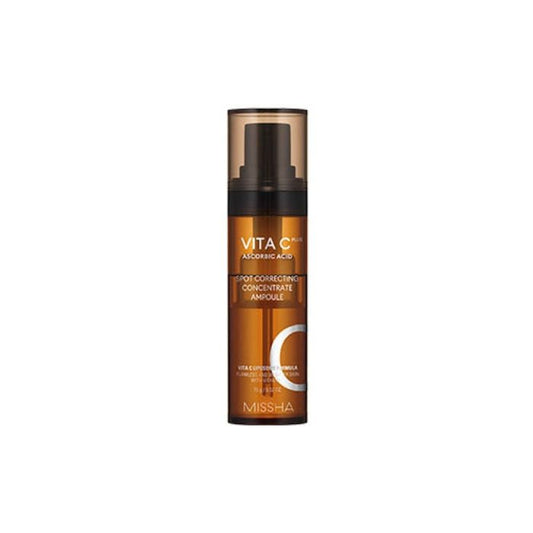 Amber pump bottle of moisturizing spot correcting concentrate ampoule with vitamin C formula on white background
