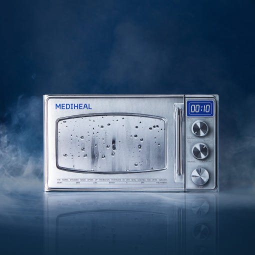 Silver metallic steamer device with condensation on glass door, digital timer set to 10 seconds, surrounded by mist