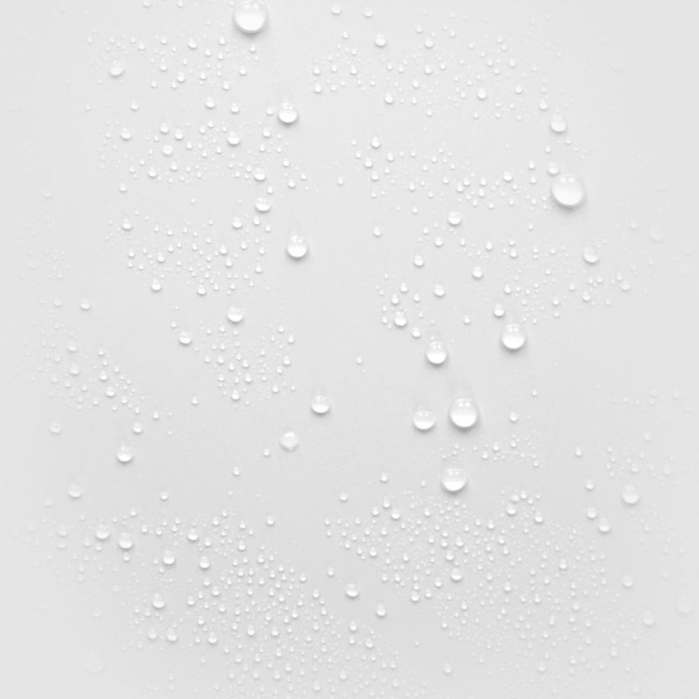 Close-up of clear liquid droplets scattered across a smooth light gray surface, highlighting hydration and freshness.