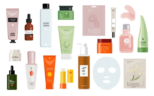 Flat lay of assorted skincare products on a white background.