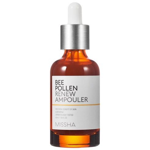 Amber glass dropper bottle of nourishing bee pollen ampouler serum with white label and silver cap on white background