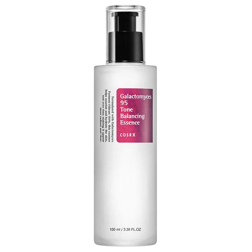 White pump bottle of galactomyces essence with pink label promoting brightening and tone balancing benefits