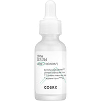 Matte white dropper bottle of soothing Cica serum with minimal black and green text on clean design label