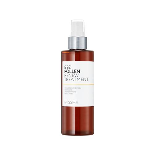 Amber spray bottle of hydrating bee pollen skin treatment with white and silver label on white background
