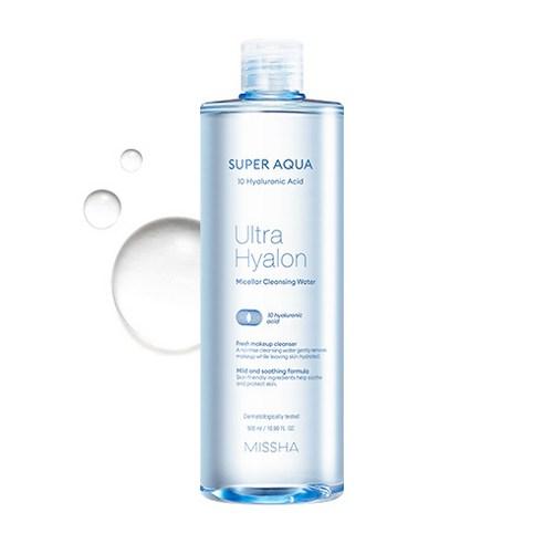 Transparent blue bottle of hydrating micellar cleansing water with hyaluronic acid on white background