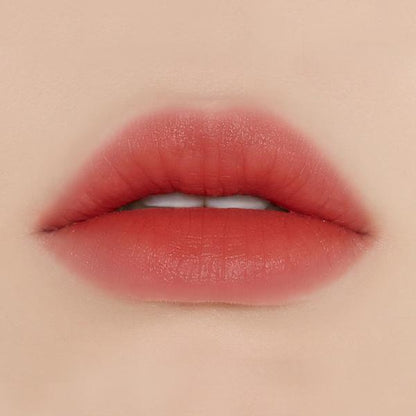 ETUDE HOUSE Fixing Tint 4g #02 Vintage Red on soft lips showcasing long-lasting vibrant red tint effect