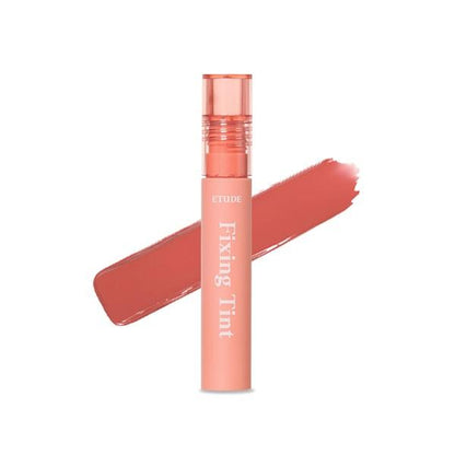 ETUDE HOUSE Fixing Tint 4g #03 Mellow Peach in slim coral tube with long-lasting wear and smooth tint swatch behind