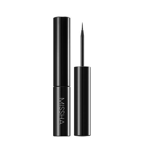 Sleek black liquid eyeliner with fine precise tip for effortless application on a clean white background