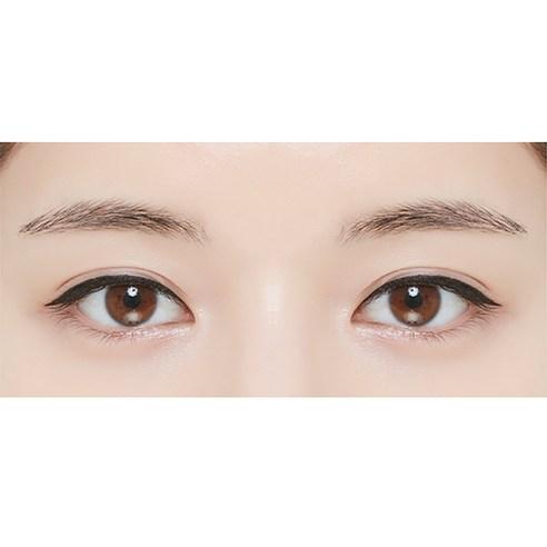 Close-up of eyes with smooth black eyeliner applied for a sharp, defined look showcasing effortless application.